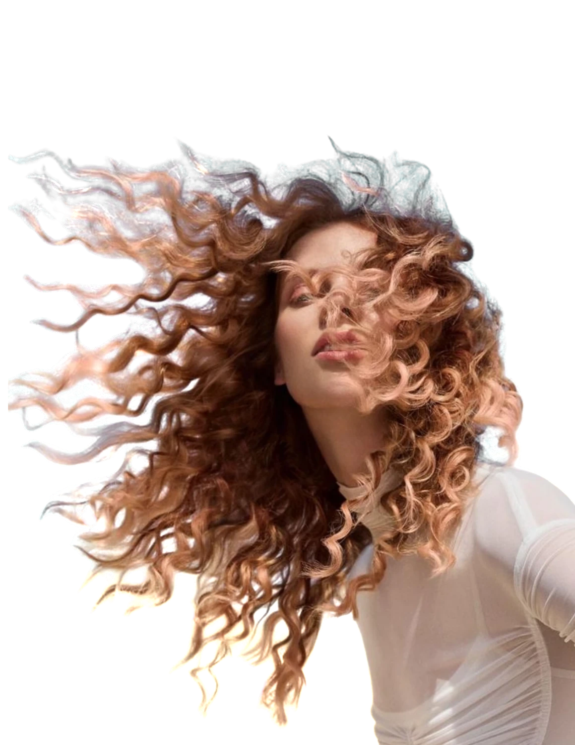 Editorial portrait of a Maevyn founding stylist, curls caught mid-motion in the wind